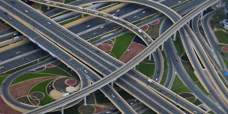 I was on vacation in Dubai last week and went to the top of the Burj Khalifa, the tallest building in the world at just over half a mile high.  I looked down and took this photo of the road network around it.  Absolutely mind-boggling how they construct all these huge roads and networks.. Photo by Nick Fewings, Unsplash.